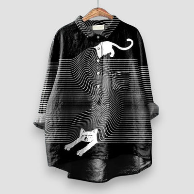 Eliana | Oversized zwarte blouse met artistieke katten en gedurfde stijl